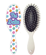 Floral Hairbrush- Delta Delta Delta